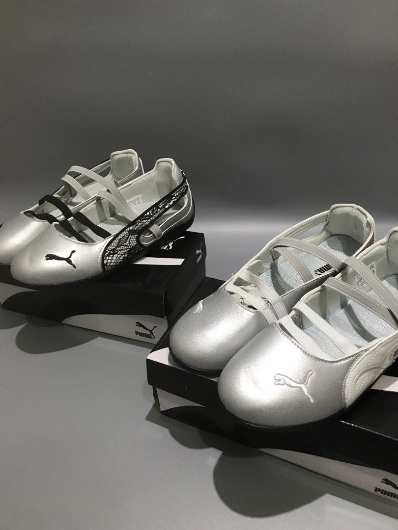 Puma Silver Ballet Flats with Straps (Category: Flats & Sandals) located in Rizal. Submitted by sakre (Listing ID 1462829373, Image 1). Description: - Silver Puma ballet flats - Features elastic straps across the top - One pair includes a black lace detail on the side - Comes with original Puma boxes - Ideal for casual wear.