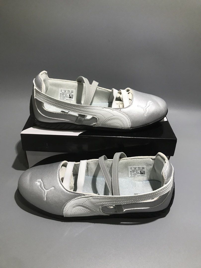 Puma Silver Ballet Flats with Straps (Category: Flats & Sandals) located in Rizal. Submitted by sakre (Listing ID 1462829373, Image 3). Description: - Silver Puma ballet flats - Features elastic straps across the top - One pair includes a black lace detail on the side - Comes with original Puma boxes - Ideal for casual wear.