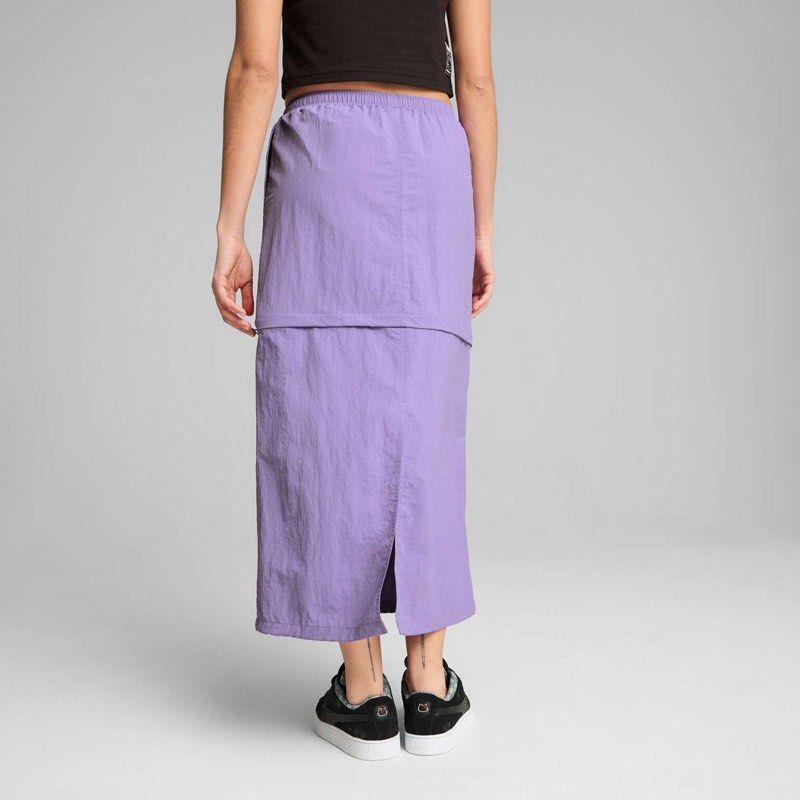 Puma x Hello Kitty Purple Skirt (Category: Skirts) located in Muntinlupa City. Submitted by pearlsarchives (Listing ID 1462837072, Image 2). Description: - Collaboration: Puma x Kitty - Color: Purple - Style: Midi skirt - Features: Elastic waistband with drawstring, back slit - Versatile: Great for casual or sporty looks - Design: Super cute!.