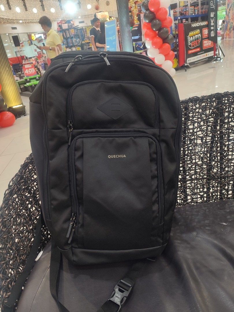 Quechua Backpack (Category: Backpacks) located in Lipa City. Submitted by gudoys_outdoor16 (Listing ID 1462841579, Image 1). Description: - Black Quechua backpack - Padded compartment fits a 15 inch laptop - Multiple pockets for easy organization - Comfortable padded straps and back panel - Perfect for school, work, or travel - Zippers are in smooth working condition - Ready for your next adventure! - 32 Liters Capacity 1800 + Sf Only.