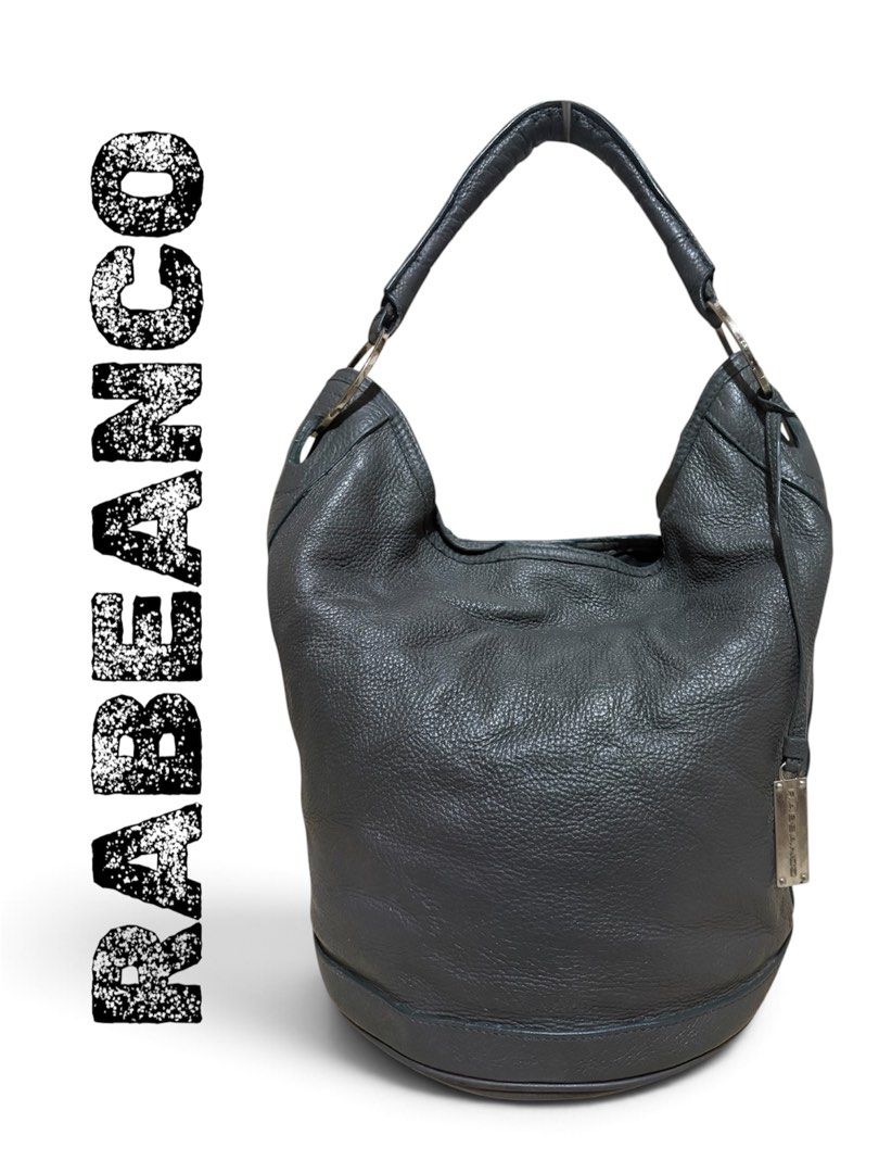 RABEANCO Gray Pebbled Leather Hobo Bag (Category: Shoulder Bags) located in Orani. Submitted by garage_poshbotique (Listing ID 1462795992, Image 1). Description: 𝓐𝓾𝓽𝓱𝓮𝓷𝓽𝓲𝓬 RABEANCO Gray pebbled leather hobo bag Material: Soft pebbled leather with a nice sheen Features: Contrasting black fabric lining, spacious interior, magnetic lock, Small hang tag, side zipper pocket Style: Classic and versatile, ideal for everyday use Size: approx. L 