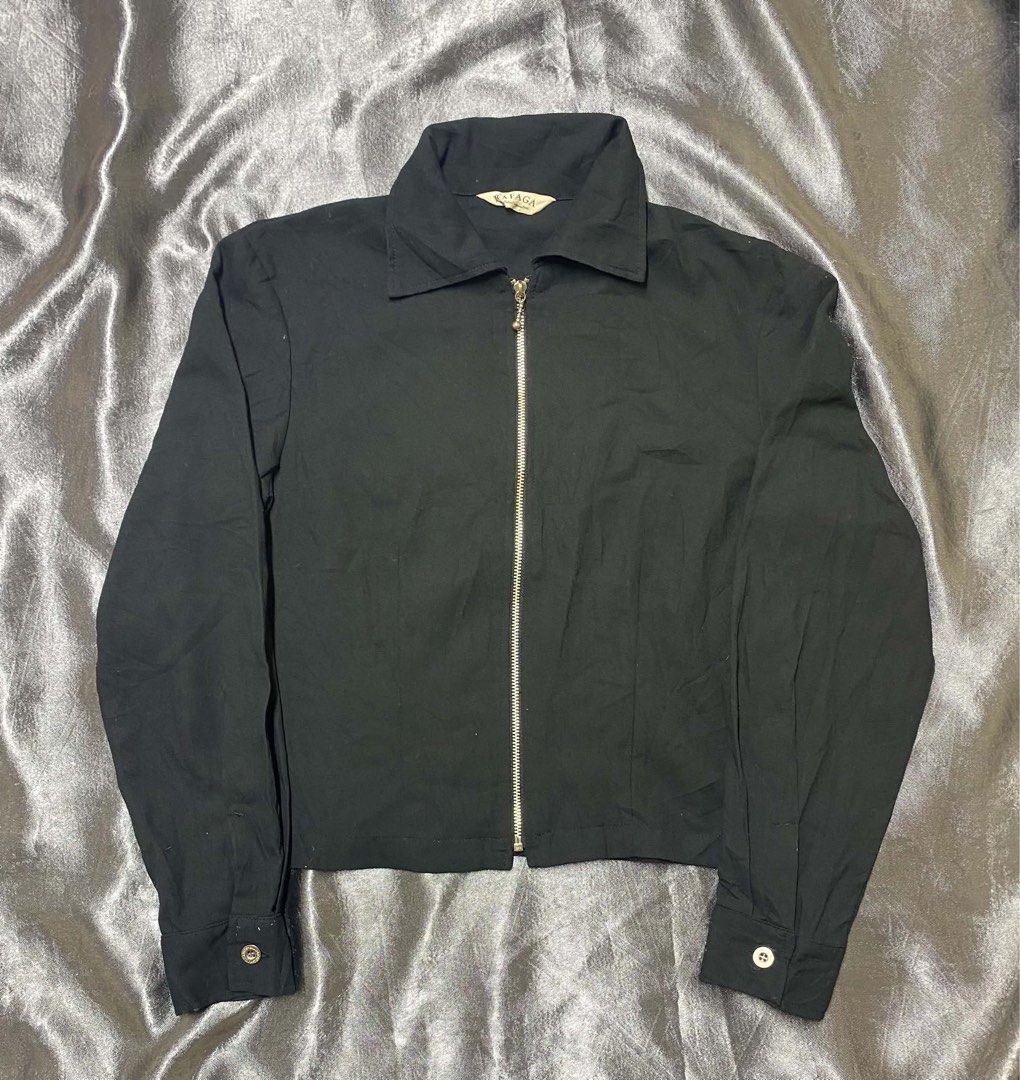 Rafaga Black Zip-Up Collared Jacket (Category: Coats, Jackets and Outerwear) located in Cavite. Submitted by bellewii (Listing ID 1462843972, Image 1). Description: - Black zip-up jacket by Rafaga - Collared neckline with silver zipper - Long sleeves with buttoned cuffs - Simple and classic design - Ideal for layering.