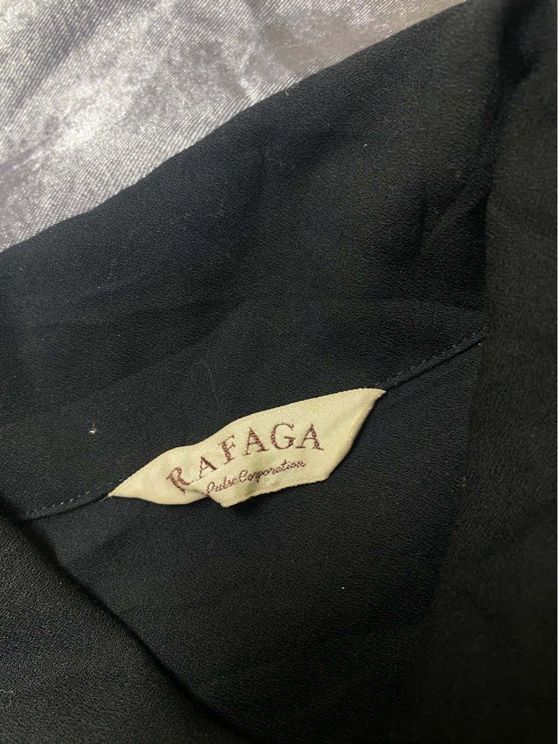 Rafaga Black Zip-Up Collared Jacket (Category: Coats, Jackets and Outerwear) located in Cavite. Submitted by bellewii (Listing ID 1462843972, Image 3). Description: - Black zip-up jacket by Rafaga - Collared neckline with silver zipper - Long sleeves with buttoned cuffs - Simple and classic design - Ideal for layering.