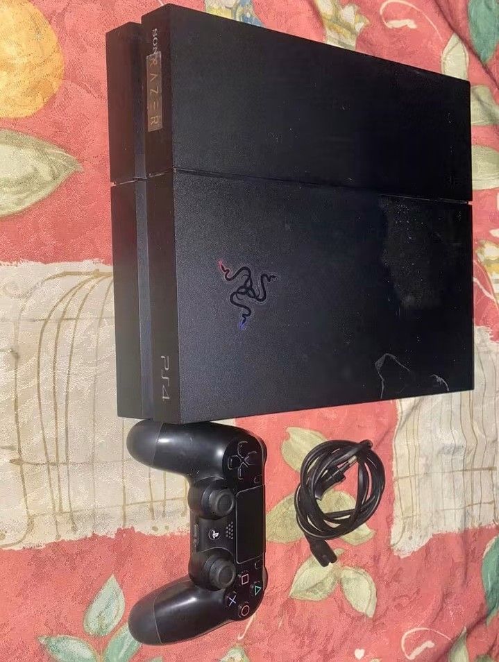 Razer PlayStation 4 Console with 8 PS4 Games (Category: PlayStation) located in Manila. Submitted by royalcat.e8356f (Listing ID 1462881953, Image 2). Description: - Razer Edition PS4 Console - Includes 1 Controller - All Necessary Cables Included - 8 PS4 Games: Mortal Kombat 11, Assassin's Creed Origins, Call of Duty Black Ops III, Elden Ring, God of War, Far Cry 4, NBA 2K23 - Bonus: NBA 2K19 Disc Included.