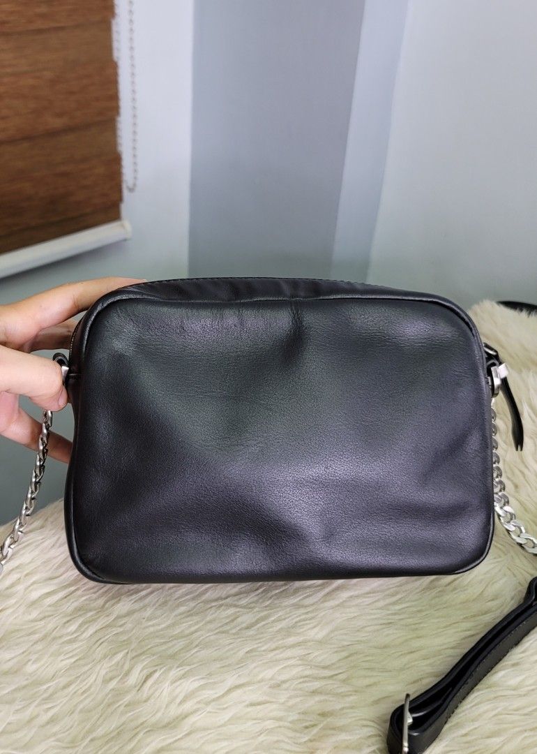 REAL Black Leather Chain Strap Crossbody Bag (Category: Cross-body Bags) located in Cavite. Submitted by amairos (Listing ID 1462721788, Image 2). Description: good condition small size silver hardware no flaws.