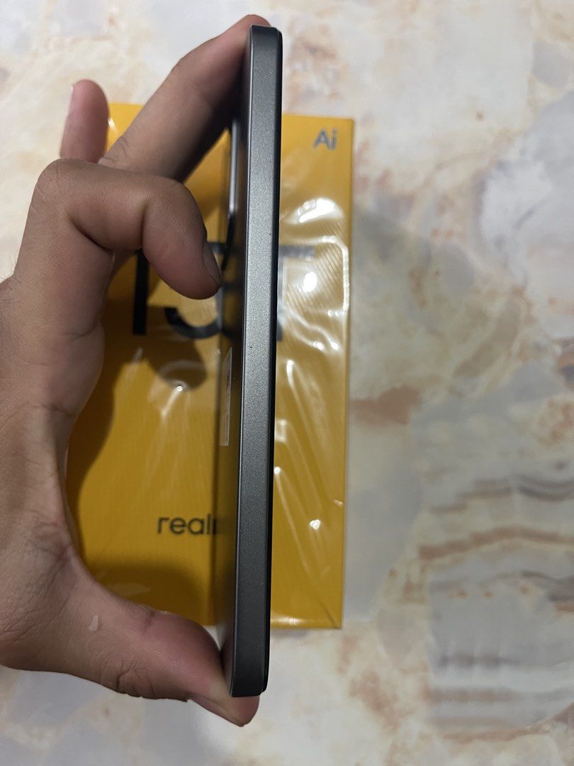 Realme 15T (Category: Realme) located in Bulacan. Submitted by chivalrymma (Listing ID 1462805158, Image 3). Description: DISPLAY • Screen Type: AMOLED • Screen Size: 6.57” • Screen Resolution: FHD+ Resolution (1080*2372) • PPI: 397 • Screen-to-Body Ratio: 93% • Refresh Rate: 120Hz • Touch Sampling Rate: 240Hz • Brightness: 1,000 Nits (typ.); 1,400 Nits (HBM); 4,000 Nits (Peak) • Extra Features: IP69, IP68, IP66 Dust-proof & Waterproof; DT-Star D