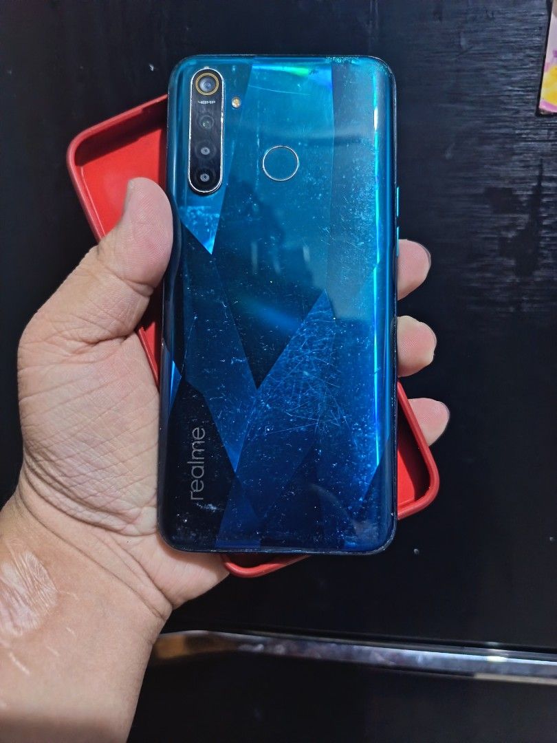 REALME 5 PRO 8/128 (Category: Realme) located in Quezon City. Submitted by khanor (Listing ID 1462731768, Image 1). Description: Realme 5 PRO🔥💫 ‎GOOD FOR GAMING!!! ‎ ‎8GB RAM ‎128GB ROM ‎Snapdragon 712 ‎Adreno 616 ‎48MP+8MP+2MP+2MP Rear Quad Camera ‎16MP Front Camera ‎Dual Nano SIM ‎Fingerprint Unlock Issue case mart at dent bawal sa maarte ‎ ‎💫comes with : [Case ] ‎💫Can do meet up /pick up QC QUEZON AVE BANAWE.