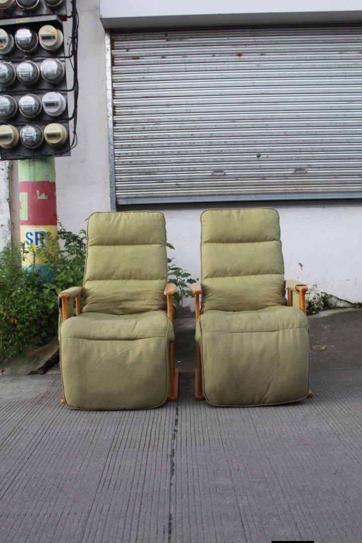 Reclining Chair (Category: Chairs) located in Meycauayan. Submitted by marygracecasimiro (Listing ID 1462862401, Image 2). Description: Pair of Japanese-Style Reclining Lounge Chairs High-back reclining lounge chairs in textured olive-green fabric, with adjustable backrests, integrated footrests, wooden armrests and convenient side pockets. Perfect for living rooms, reading corners or relaxation areas L:24 ½ • W:24 • Seat H:17 • Back H:32 • inche