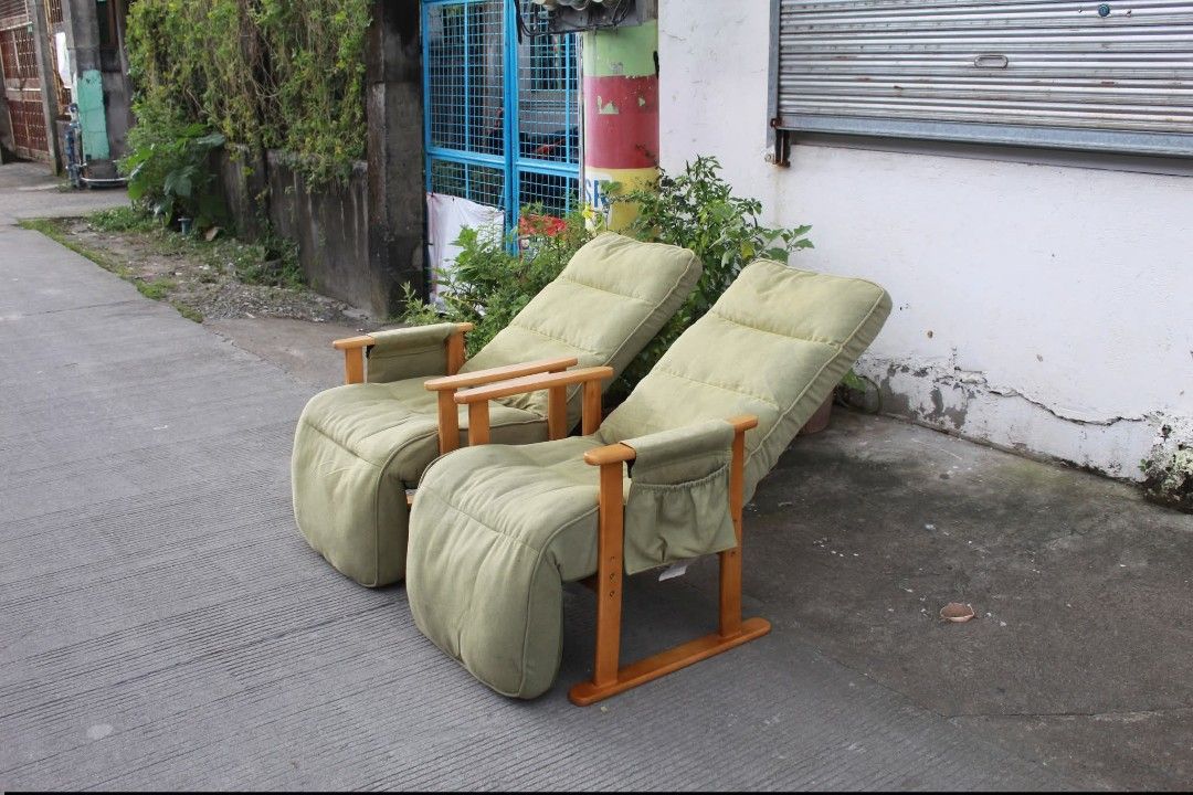 Reclining Chair (Category: Chairs) located in Meycauayan. Submitted by marygracecasimiro (Listing ID 1462862401, Image 3). Description: Pair of Japanese-Style Reclining Lounge Chairs High-back reclining lounge chairs in textured olive-green fabric, with adjustable backrests, integrated footrests, wooden armrests and convenient side pockets. Perfect for living rooms, reading corners or relaxation areas L:24 ½ • W:24 • Seat H:17 • Back H:32 • inche