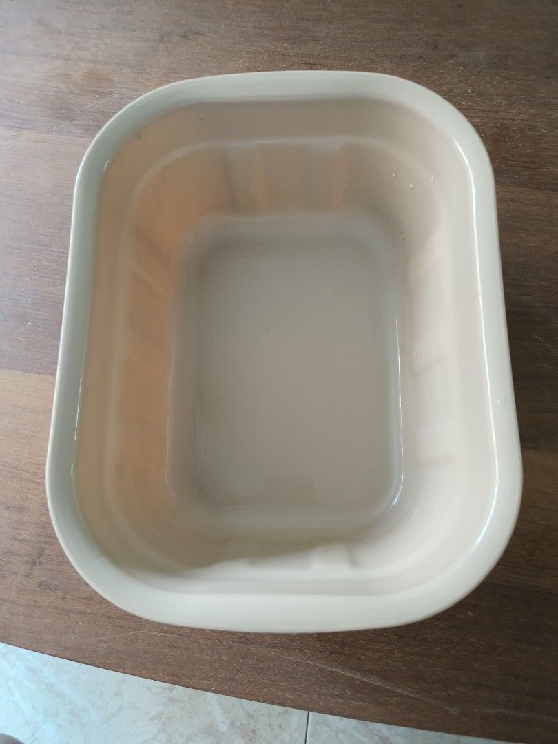 Rectangular basin (Category: Bathroom & Kitchen Fixtures) located in Singapore. Submitted by kmittons (Listing ID 1462736331, Image 1). Description: - Beige rectangular basin - Scratches on the base of the basin - Bought for $2.50 at Clementi - I used it to store gardening tools - Not for fussy buyers - Can only transact on Saturdays .