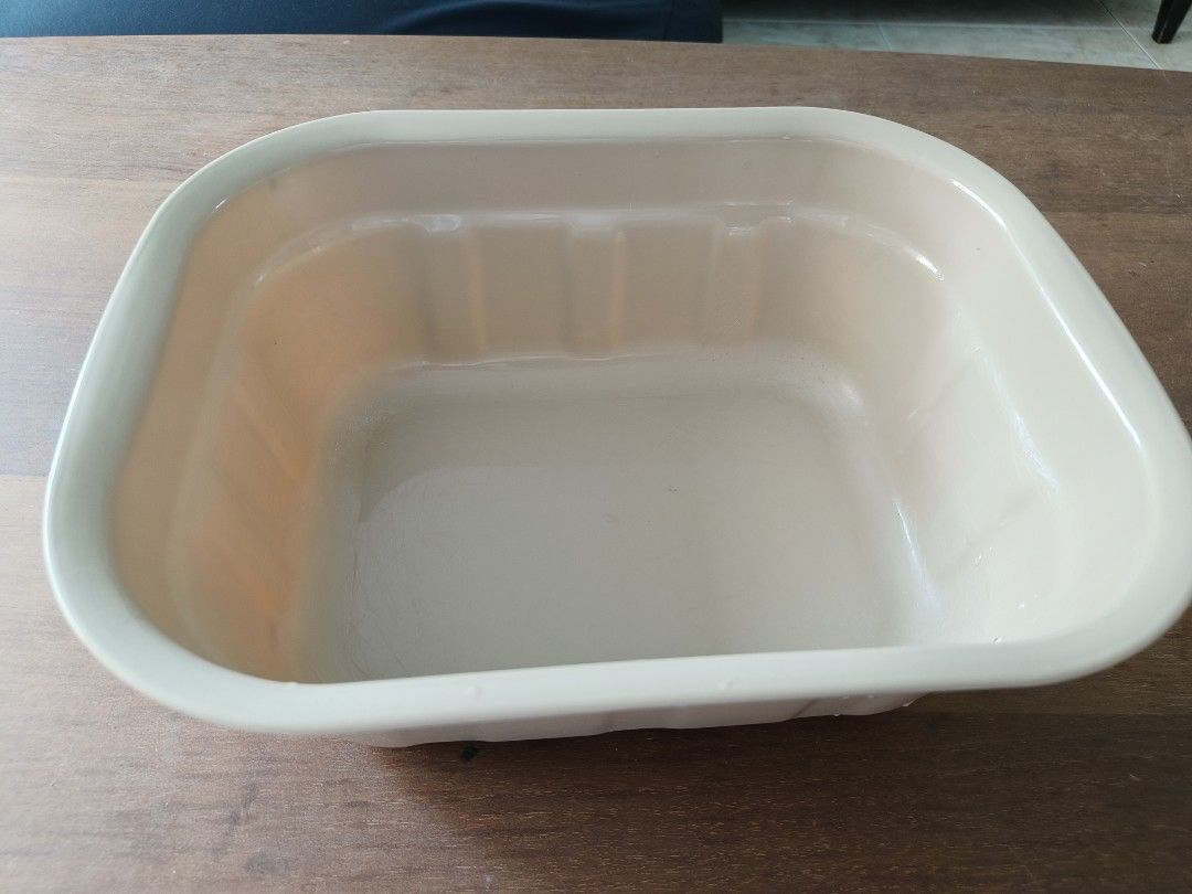 Rectangular basin (Category: Bathroom & Kitchen Fixtures) located in Singapore. Submitted by kmittons (Listing ID 1462736331, Image 2). Description: - Beige rectangular basin - Scratches on the base of the basin - Bought for $2.50 at Clementi - I used it to store gardening tools - Not for fussy buyers - Can only transact on Saturdays .