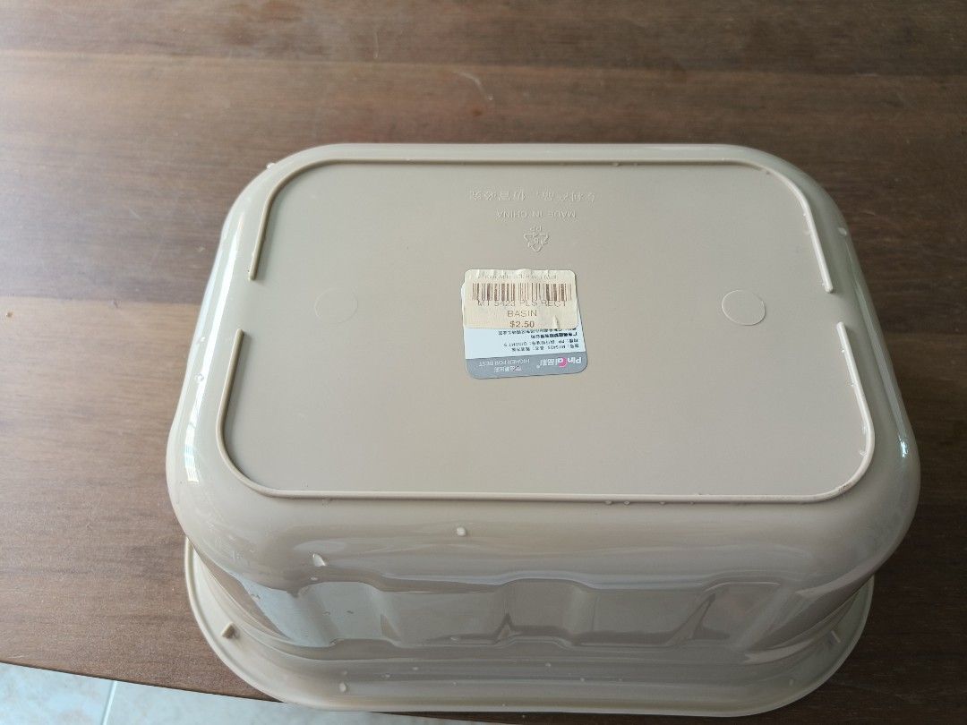 Rectangular basin (Category: Bathroom & Kitchen Fixtures) located in Singapore. Submitted by kmittons (Listing ID 1462736331, Image 3). Description: - Beige rectangular basin - Scratches on the base of the basin - Bought for $2.50 at Clementi - I used it to store gardening tools - Not for fussy buyers - Can only transact on Saturdays .