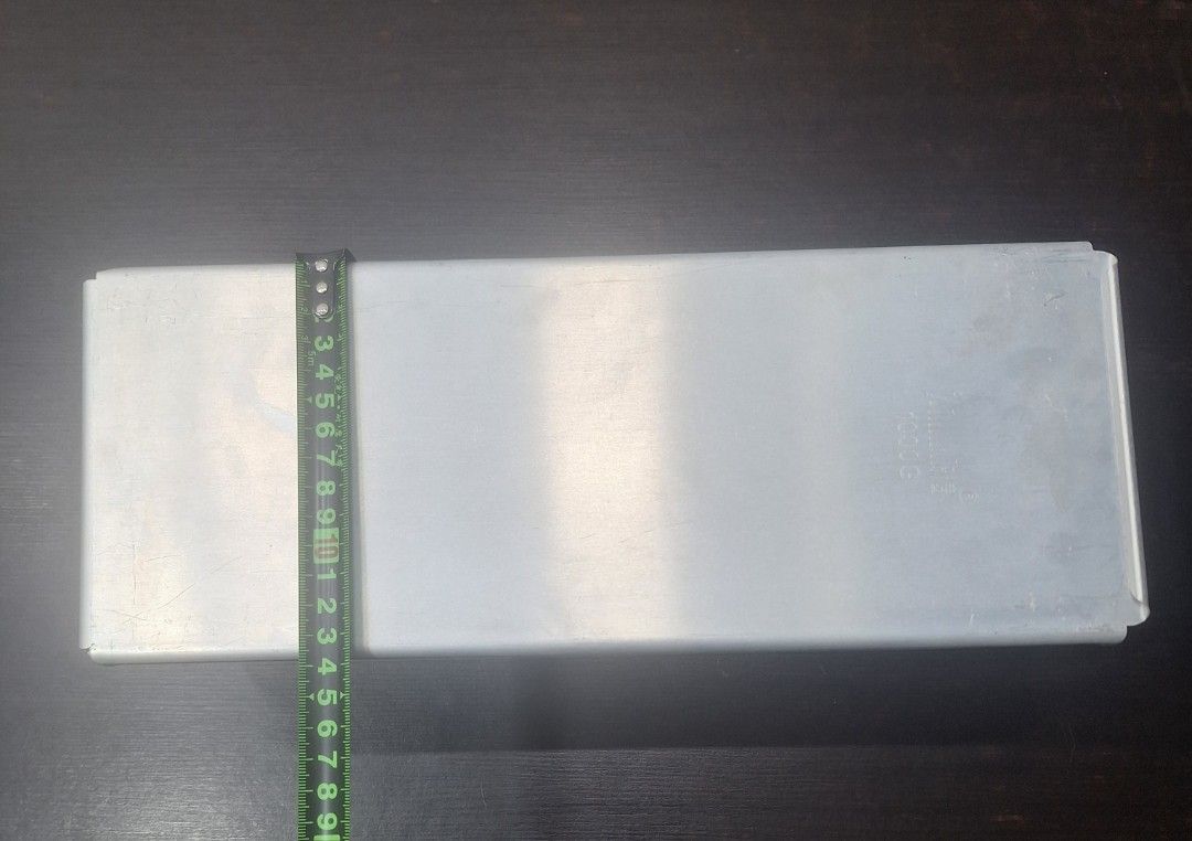 Rectangular Loaf Pan for Baking Bread (Category: Bakeware) located in Singapore. Submitted by florinsthon (Listing ID 1462861548, Image 3). Description: - Rectangular loaf pan with cover - Non-stick coating for easy release - Perforated bottom for even heat distribution - Ideal for baking bread, cakes, and more - Approximate dimensions: 35cm (L) x 13cm (W) Large size.