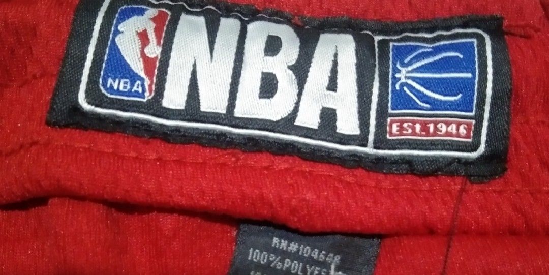 Red NBA Basketball Shorts Size M (Category: Shorts) located in Quezon City. Submitted by aljonbermu25659 (Listing ID 1462743192, Image 3). Description: - Red NBA basketball shorts - Black and white stripe detail on sides - Elastic waistband for comfort - Made of 100% polyester - Size M - Made in Egypt.