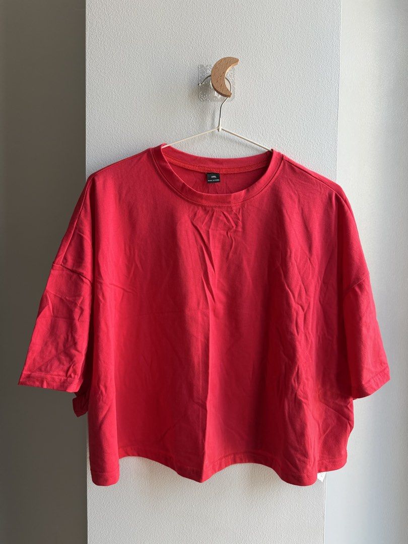 Red Oversized Cropped T-shirt (Category: Shirts) located in Makati City. Submitted by ariannelaz54133 (Listing ID 1462836523, Image 1). Description: - Red cropped t-shirt - Loose fit, very comfy - Short sleeves - Ideal for casual wear - Versatile and easy to style.