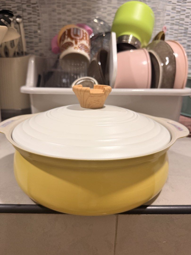 Redchef Casserole Dish with Lid - Yellow (Category: Cookware & Accessories) located in Mandaluyong City. Submitted by riz_040521 (Listing ID 1462883942, Image 1). Description: - Cheerful yellow casserole dish - Comes with a white lid featuring a wooden handle - Durable textured metal base - Perfect for baking or serving your favorite dishes - Generous size: approximately 10 inches across - Interior is clean and ready for use.
