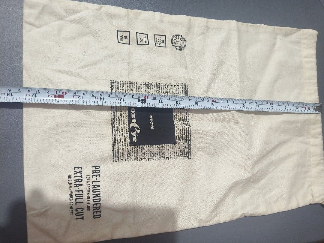 Renown Next Eye Cotton Drawstring Dust Bag (Category: Luxury Bags & Wallets) located in San Jose del Monte. Submitted by m_nshop (Listing ID 1462814043, Image 3). Description: - Cream colored drawstring dust bag - Made of 100% cotton - Pre-laundered for extra comfort - Generous size: Approx. 18" wide x 16" tall - Features a small logo print - Ideal for storing shoes, gym gear, or other small essentials payment first jnt or lalamove courier.
