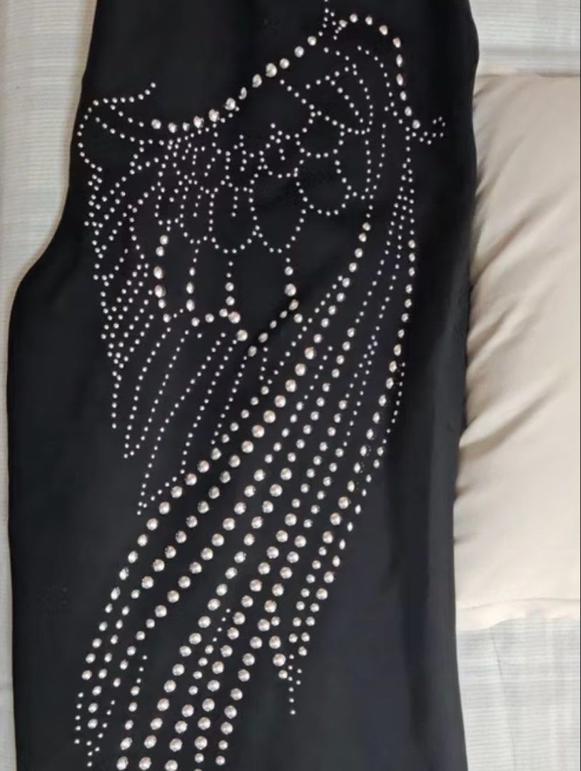 Rhinestone Wings Sweatpants (Category: Other Bottoms) located in San Fernando. Submitted by materialgirlxx (Listing ID 1462691963, Image 3). Description: - Cool dark blue sweatpants - Sparkly rhinestone wing design on the side - Elastic waistband with drawstring - Wide leg fit - Comfortable and stylish for casual wear or a statement outfit.