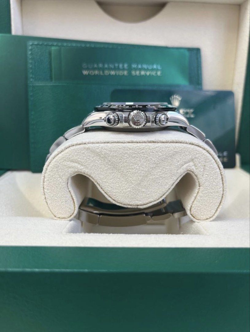 Rolex Daytona Black Dial Stainless Steel Watch (Category: Watches) located in Singapore. Submitted by jochew37 (Listing ID 1462769545, Image 3). Description: - Rolex Daytona - Black dial - Stainless steel bracelet - Chronograph function - Original box and papers included - Ideal for collectors - Serious buyers only Year 2024 Unworn Rolex Cosmograph Daytona 116500LN featuring the classic black dial and iconic black Cerachrom bezel. The 40mm Oyster