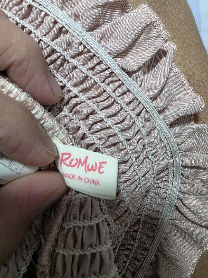 Romwe Smocked Tube Top with Ruffle Trim small (Category: Sleeveless) located in Paranaque City. Submitted by franinnashop (Listing ID 1462688198, Image 3). Description: - Cute smocked tube top from Romwe - Features ruffle trim along top and bottom edges - Made of 100% polyester fabric - Versatile for casual outings or dressing up declutter small paranaque city.