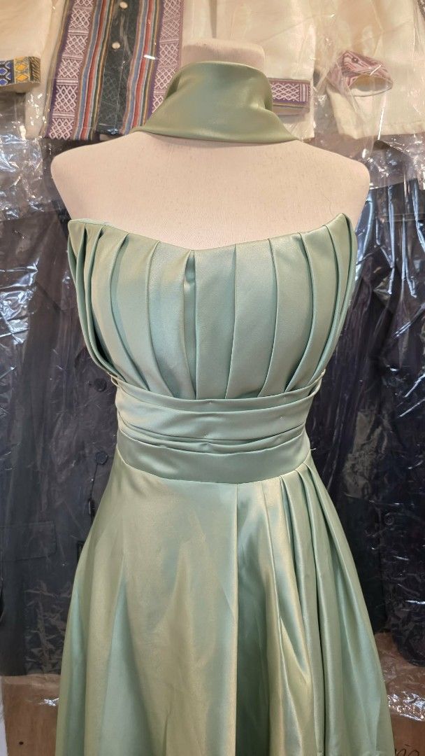 Sage Green Strapless Gown with Scarf (Category: Evening dresses & gowns) located in Bulacan. Submitted by zj.onlineshop (Listing ID 1462684336, Image 2). Description: used once Adjustable at the back - Strapless sage green gown - Features a pleated bodice - Comes with a matching scarf - Full, flowing skirt - Ideal for formal events and parties.