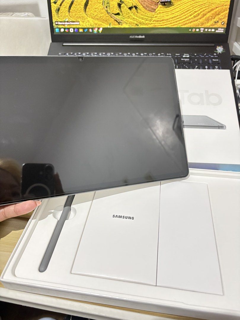 Samsung Galaxy Tab S9 FE with S Pen (Category: Android) located in Manila. Submitted by ch111wy (Listing ID 1462821882, Image 3). Description: - Samsung Galaxy Tab S9 FE 6GB RAM | 128 GB Storage | GRAY - Includes S Pen - Like new, sealed in original packaging - Ideal for work, study, and entertainment - Used only for studying, but figured I am more okay with iPad! .