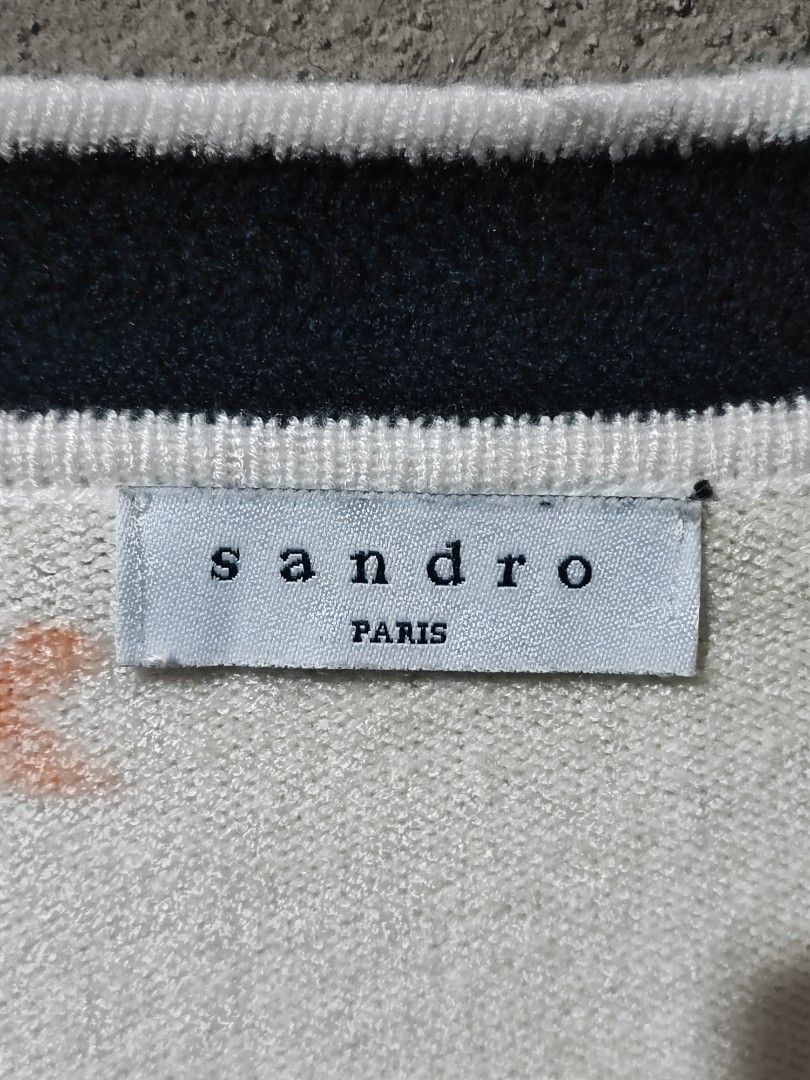 SANDRO PARIS TWO-TONE KNITTED CARDIGAN (Category: Coats, Jackets and Outerwear) located in Iloilo. Submitted by gooddimes (Listing ID 1462860111, Image 3). Description: Sandro Paris Two-Tone Knitted Cardigan Authentic With two front pockets Size on tag: 2 Dimes: 17Wx18.5L Issue/s: None, need wash Color rate: 9.8/10 Excellent condition ₱1,500 Reminders: - All items are thrifted, please manage your expectations - Color may vary due to lighting - Pl