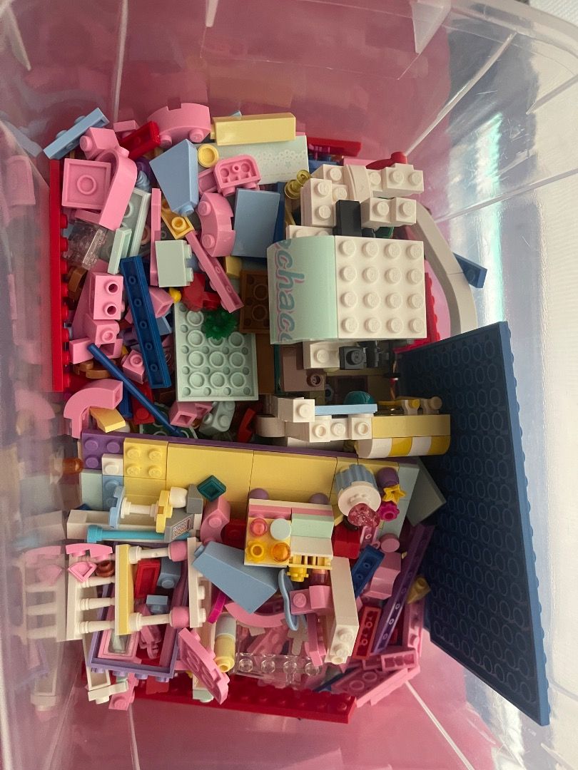 5 Sanrio Building Blocks - Pompompurin & Kuromi (Category: Lego & Building Sets) located in Marikina City. Submitted by bezz_bezzy (Listing ID 1462805816, Image 2). Description: - Two built Sanrio building block sets: Pompompurin and Kuromi. - Both sets have been displayed. - Large bin of assorted pink, blue, and yellow building blocks included. - Perfect for creative building projects. - Ideal for Sanrio fans and building enthusiasts..