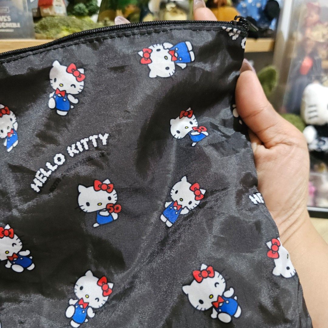 Sanrio Hello Kitty Black Pouch (Category: Purses & Pouches) located in Manila. Submitted by lovelylovesjapan (Listing ID 1462743162, Image 2). Description: 🌸The item is on-hand and authentic from Japan 🌸Mode of Payment (MOP): GCASH/Bank Transfer 🌸Mode of Delivery (MOD): J&T or Lalamove (Shipping every Saturday and Sunday) Notes: 🩷Breakable items are packed with care and caution. Seller will not be held liable for any damages incurred by the c