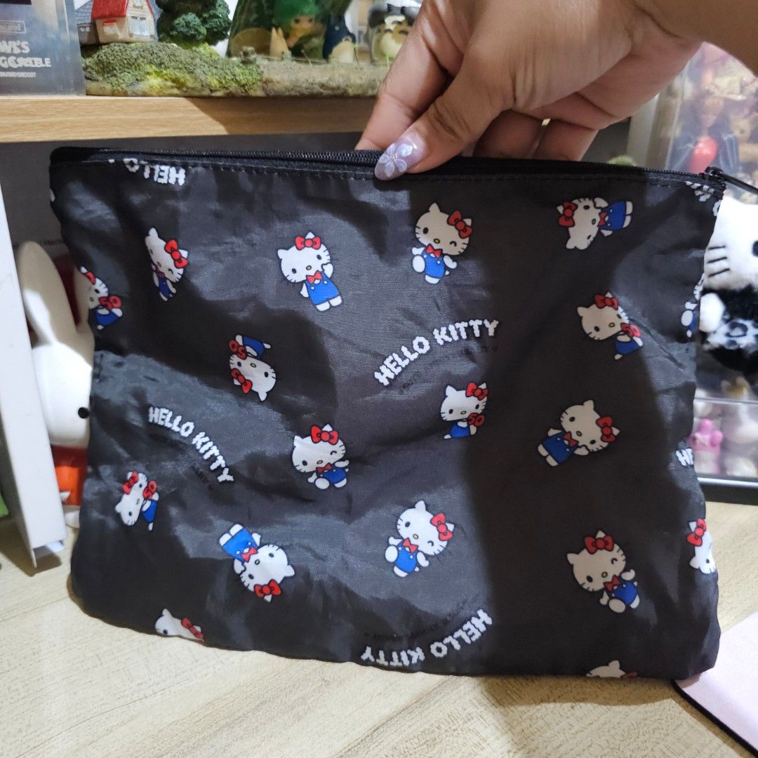 Sanrio Hello Kitty Black Pouch (Category: Purses & Pouches) located in Manila. Submitted by lovelylovesjapan (Listing ID 1462743162, Image 1). Description: 🌸The item is on-hand and authentic from Japan 🌸Mode of Payment (MOP): GCASH/Bank Transfer 🌸Mode of Delivery (MOD): J&T or Lalamove (Shipping every Saturday and Sunday) Notes: 🩷Breakable items are packed with care and caution. Seller will not be held liable for any damages incurred by the c