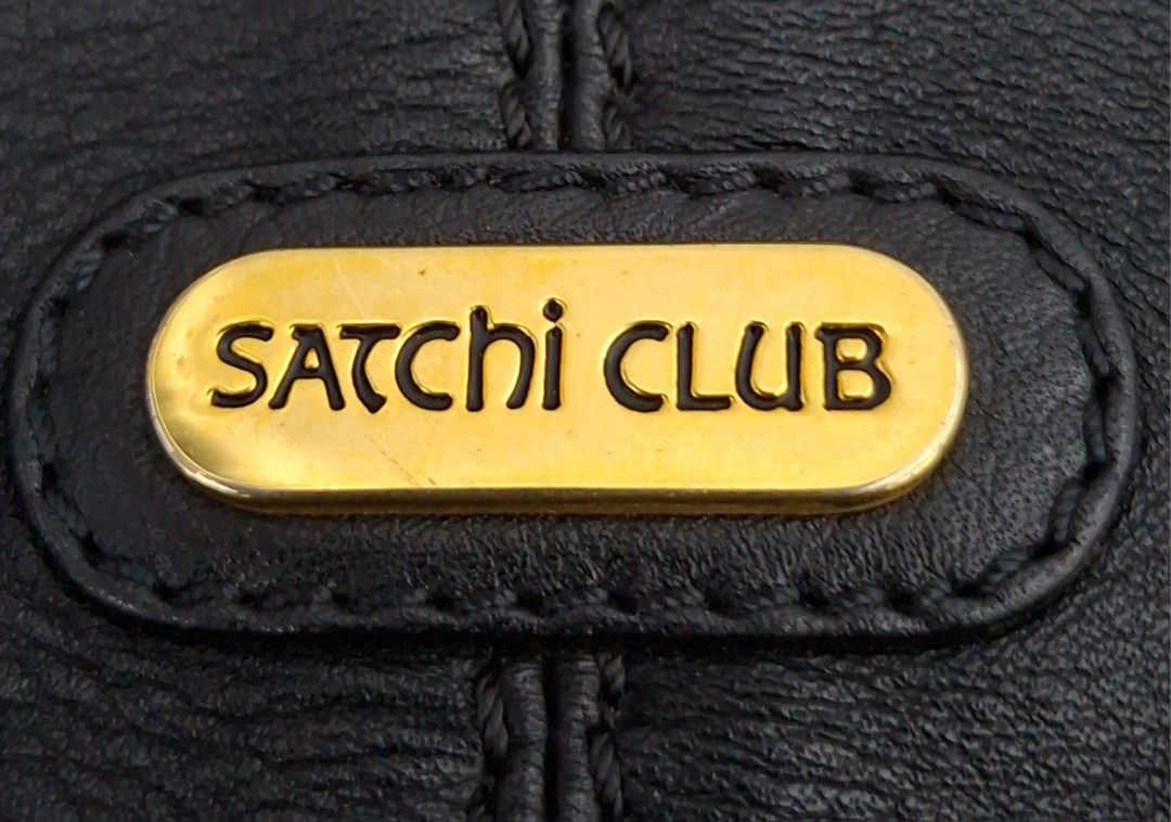 Satchi Club Black Leather Shoulder Bag (Category: Shoulder Bags) located in Quezon City. Submitted by moonthrifting (Listing ID 1462710355, Image 2). Description: - Brand: Satchi Club - Material: Genuine Leather - Color: Black - Closure: Magnetic snap - Interior: 1 zippered pocket - Hardware: Gold tone - Straps: Adjustable buckles - Style: Classic, perfect for everyday use.