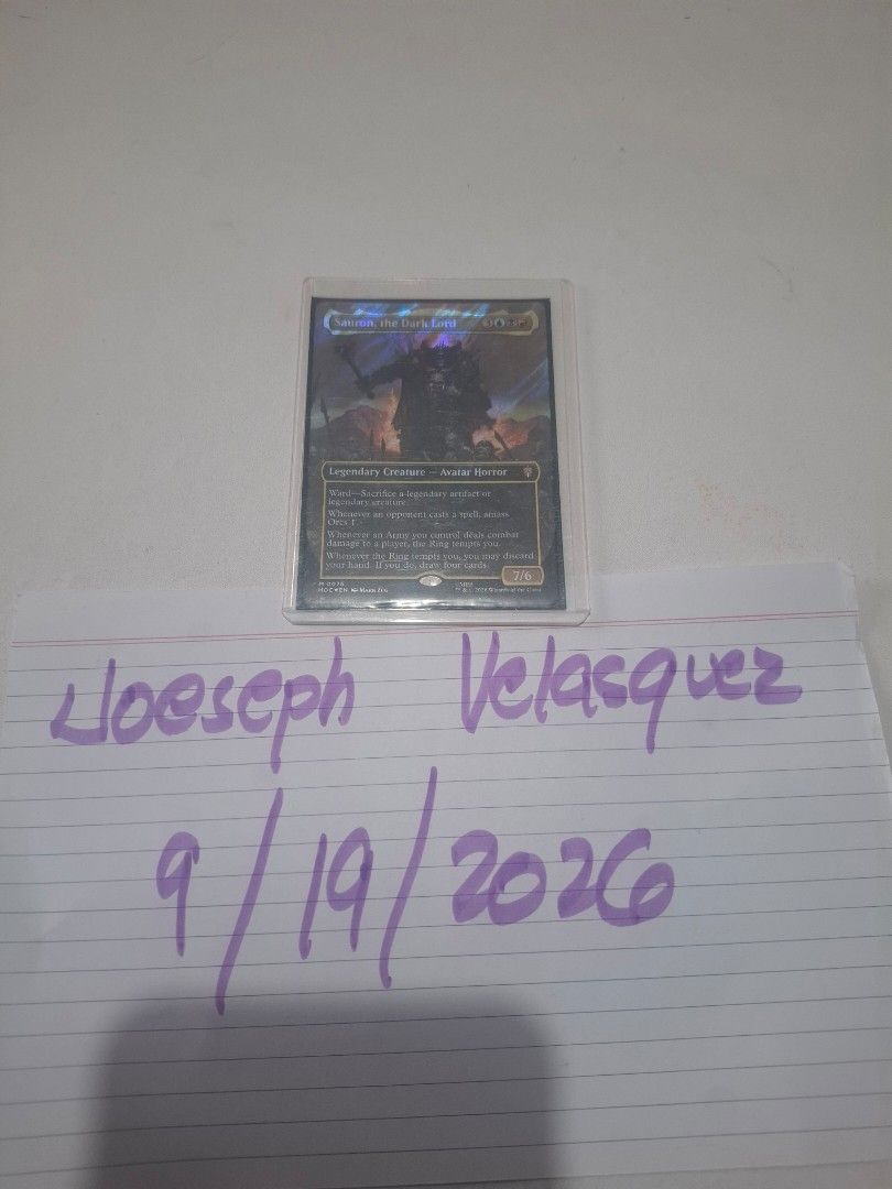 Sauron, the Dark Lord MTG Card (Category: Raw Singles) located in Quezon City. Submitted by joe320 (Listing ID 1462776119, Image 1). Description: - Card: Sauron, the Dark Lord - Type: Legendary Creature, Avatar Horror - Set/Number: M 0976 / 0076 - Year: 2023 - Manufacturer: Wizards of the Coast - Abilities: - Ward - Sacrifice a legendary artifact or Orcs 1 - Whenever an Army you control deals combat damage to the Ring-tempted, you may discard you