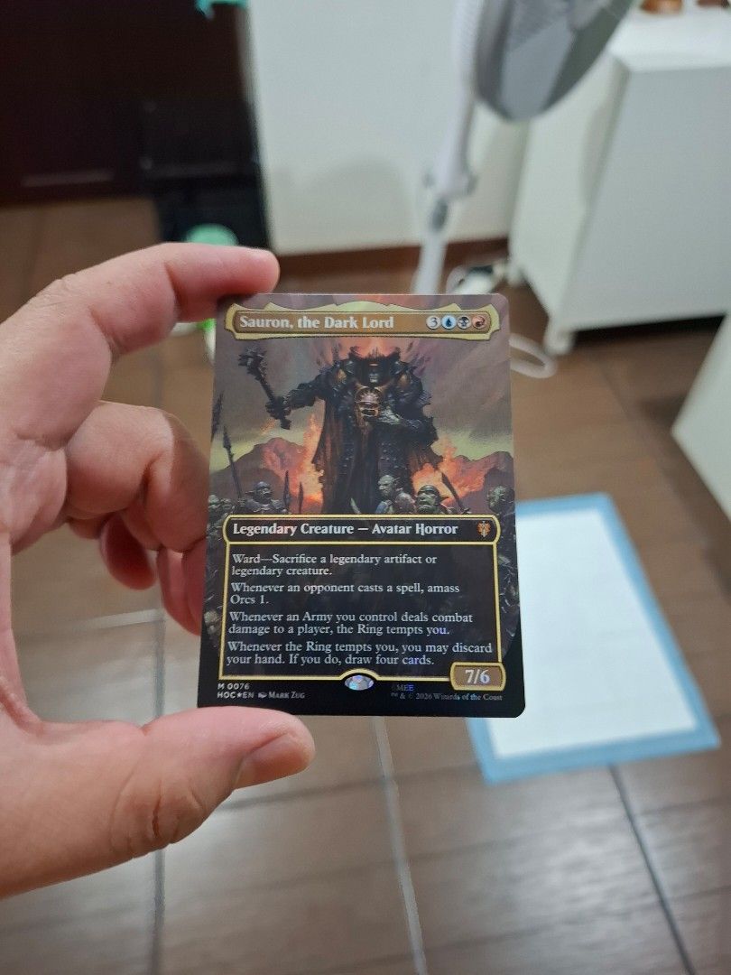 Sauron, the Dark Lord MTG Card (Category: Raw Singles) located in Quezon City. Submitted by joe320 (Listing ID 1462776119, Image 2). Description: - Card: Sauron, the Dark Lord - Type: Legendary Creature, Avatar Horror - Set/Number: M 0976 / 0076 - Year: 2023 - Manufacturer: Wizards of the Coast - Abilities: - Ward - Sacrifice a legendary artifact or Orcs 1 - Whenever an Army you control deals combat damage to the Ring-tempted, you may discard you