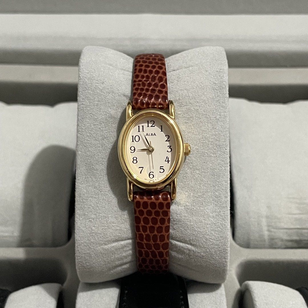 Seiko Alba Oval Face Dainty Watch (Category: Women's Watches) located in Manila. Submitted by darimilkkk_ (Listing ID 1462830809, Image 1). Description: - Classic ALBA watch - Gold-tone oval case - Cream dial with clear Arabic numerals - Brown textured leather strap - Simple and elegant design - Ideal for everyday wear.