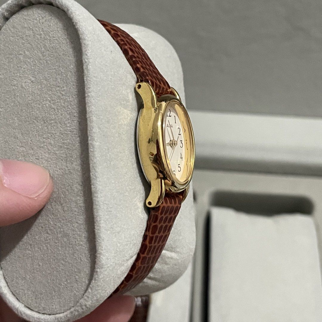 Seiko Alba Oval Face Dainty Watch (Category: Women's Watches) located in Manila. Submitted by darimilkkk_ (Listing ID 1462830809, Image 2). Description: - Classic ALBA watch - Gold-tone oval case - Cream dial with clear Arabic numerals - Brown textured leather strap - Simple and elegant design - Ideal for everyday wear.