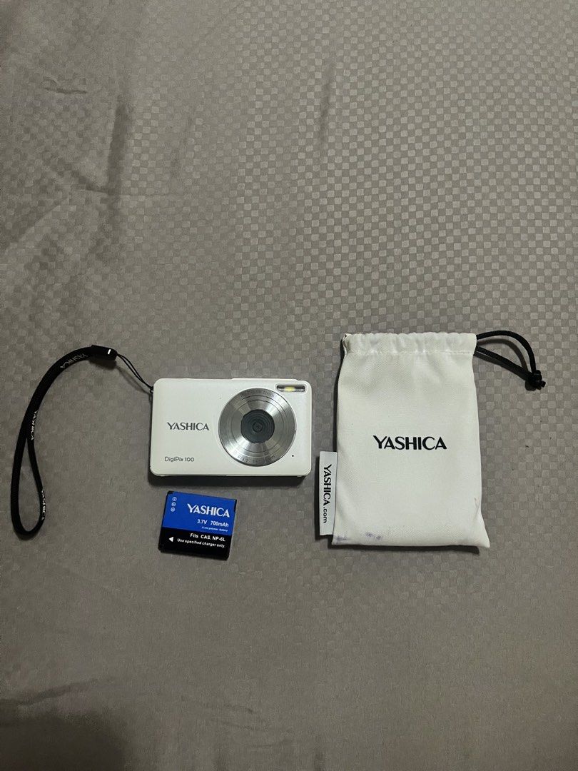 SELLING YASHICA PIXPRO 100 DIGICAM (Category: Other Accessories) located in Manila. Submitted by chuadenise28288 (Listing ID 1462822298, Image 1). Description: Yashica Pixpro 100 RFS: need funds 🥹 - Comes w the battery, pouch, lanyard, charger. - Please be reminded there is no SD card. - Can negotiate price. - Slightly used but no damage at all. Used it with care. 📍Taguig Delivery: Lalamove .