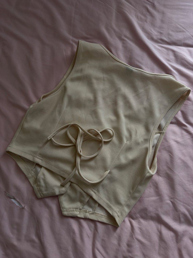 SHEIN Beige Vest and Pants Set (Category: Sets or Coordinates) located in Manila. Submitted by leean0924 (Listing ID 1462885042, Image 2). Description: - Beige vest and matching pants set from SHEIN - Size: Medium (M) for both pieces - Vest features button front and adjustable tie back - Pants are high-waisted with a flattering straight leg cut - Versatile: Wear together for a polished look or separately - Ideal for creating chic, put-together ou
