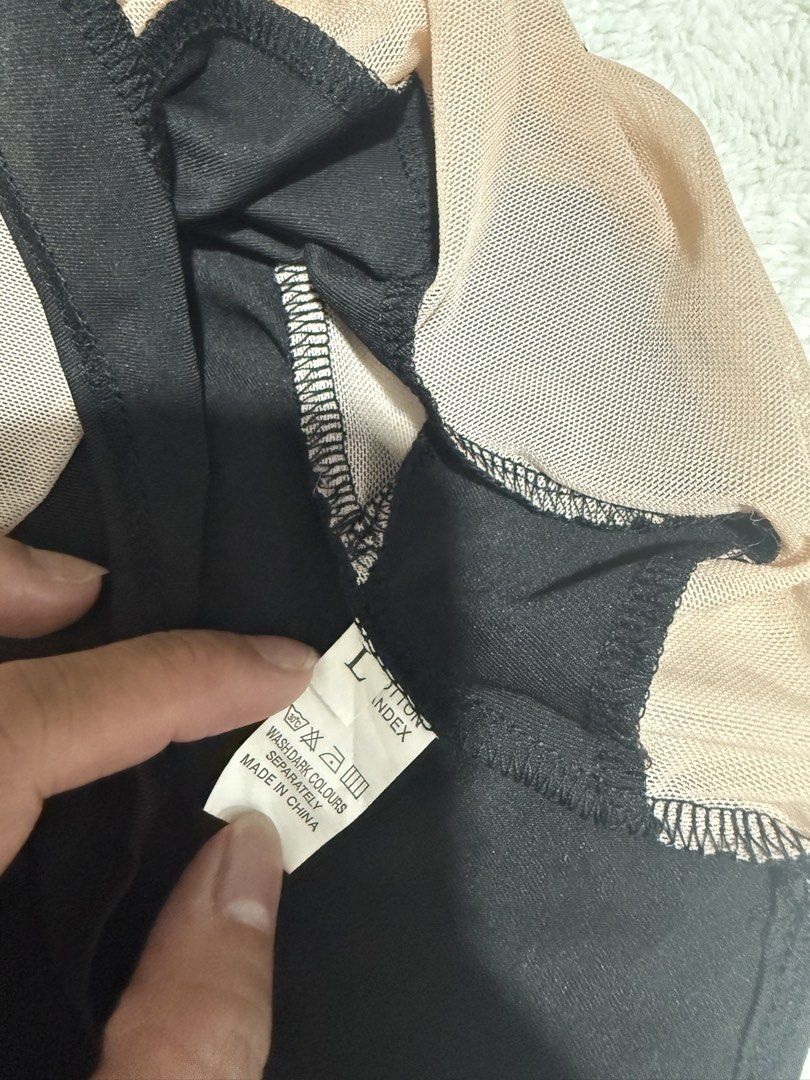 SHEIN Black & Nude One-Shoulder Bodysuit | Large (Category: Others Tops) located in Manila. Submitted by meisu_mnl (Listing ID 1462831241, Image 3). Description: SHEIN Black & Nude One-Shoulder Bodysuit 🖤🤎 Lightly used ✨ Size: L Bust: 32–38" Waist: 28–36" • One-shoulder design • Black & nude contrast • Sheer mesh panel detail • Stretchy, comfortable fabric • Snap-button closure • Flattering fitted silhouette Chic and classy with a little edge! 