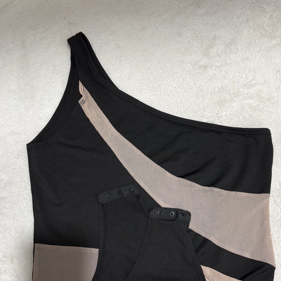 SHEIN Black & Nude One-Shoulder Bodysuit | Large (Category: Others Tops) located in Manila. Submitted by meisu_mnl (Listing ID 1462831241, Image 2). Description: SHEIN Black & Nude One-Shoulder Bodysuit 🖤🤎 Lightly used ✨ Size: L Bust: 32–38" Waist: 28–36" • One-shoulder design • Black & nude contrast • Sheer mesh panel detail • Stretchy, comfortable fabric • Snap-button closure • Flattering fitted silhouette Chic and classy with a little edge! 