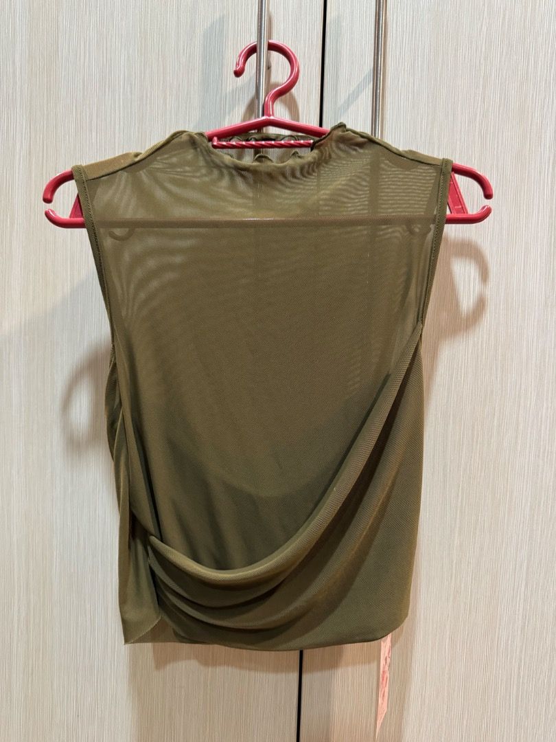 SHEIN Olive Green Mesh Cropped Top (Size M) (Category: Sleeveless) located in Quezon City. Submitted by anne.declutter (Listing ID 1462730314, Image 1). Description: SHEIN Olive Green Mesh Cropped Top (Size M) RFS - decluttering, never used MOP - GCash (payment first) Shipping fee shouldered by buyer Location - Quezon City.