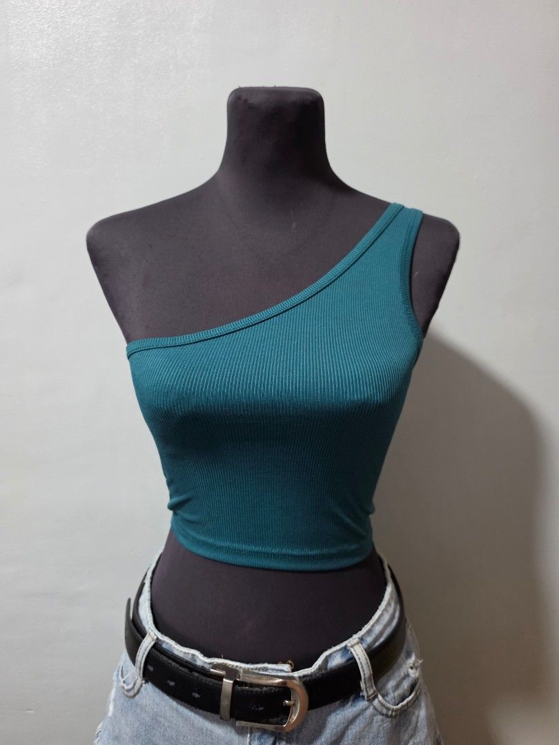 SHEIN Ribbed Crop Top Teal one side xsmall (Category: Others Tops) located in Paranaque City. Submitted by franinnashop (Listing ID 1462689782, Image 1). Description: - Teal ribbed crop top - Brand: SHEIN - Estimated Size: XS (stretchy material) - Versatile: Great for layering or wearing solo - Style: Casual, pairs well with jeans or shorts declutter xsmall paranaque city.