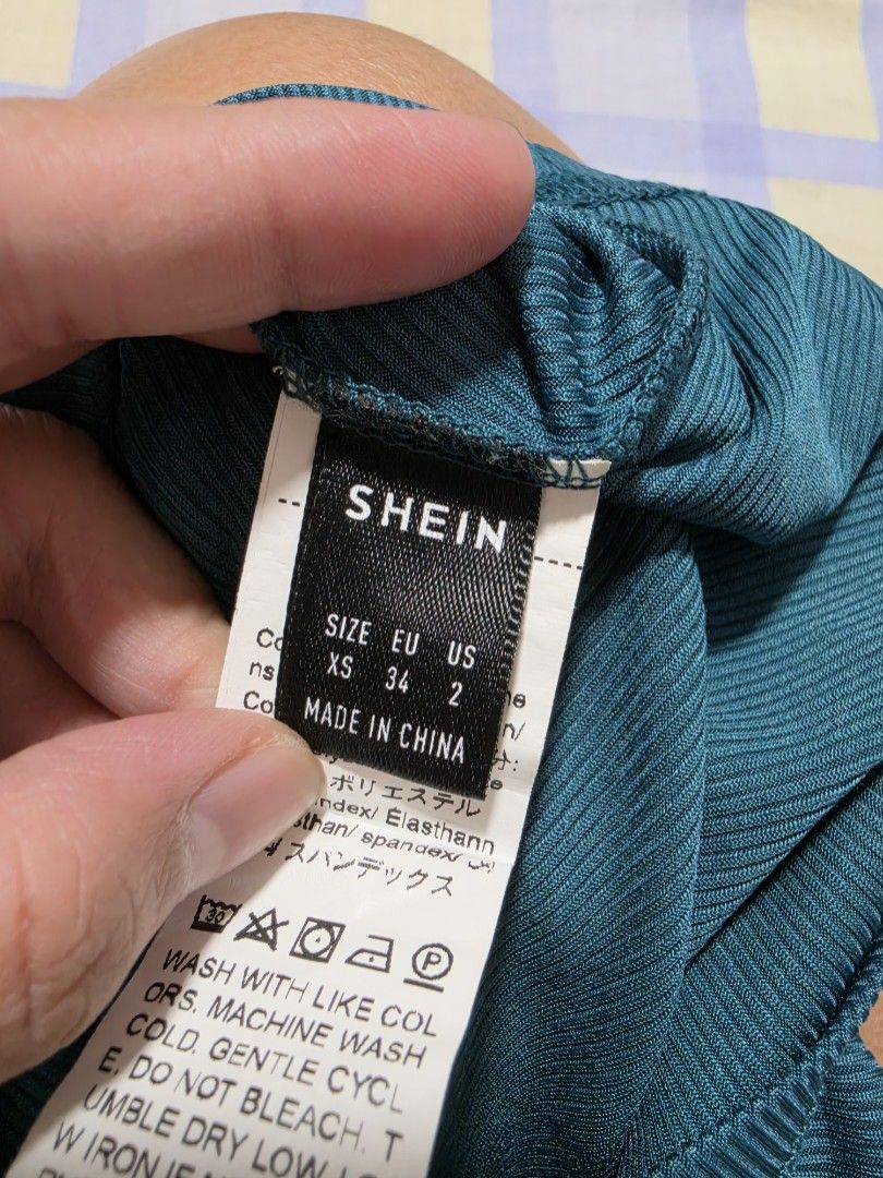 SHEIN Ribbed Crop Top Teal one side xsmall (Category: Others Tops) located in Paranaque City. Submitted by franinnashop (Listing ID 1462689782, Image 3). Description: - Teal ribbed crop top - Brand: SHEIN - Estimated Size: XS (stretchy material) - Versatile: Great for layering or wearing solo - Style: Casual, pairs well with jeans or shorts declutter xsmall paranaque city.