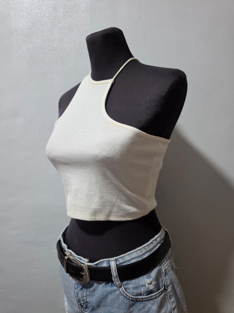 SHEIN Ribbed Knit Spaghetti Strap Crop Top XS (Category: Sleeveless) located in Paranaque City. Submitted by franinnashop (Listing ID 1462689905, Image 2). Description: - SHEIN white ribbed knit crop top - Spaghetti strap design - Perfect for layering or wearing solo - Super comfy and stretchy material declutter xs to small paranaque city.