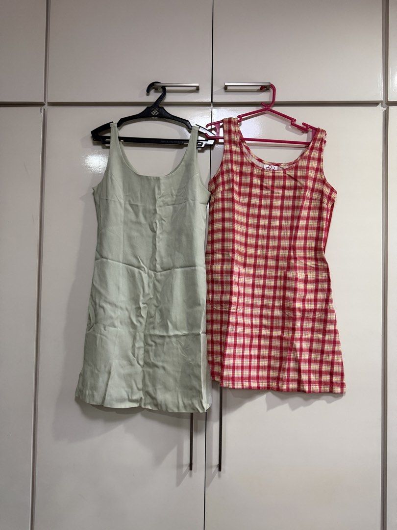 Short sleeveless Dress ( take both) (Category: Dresses) located in Caloocan City. Submitted by redkooky (Listing ID 1462730341, Image 1). Description: Kamiseta phils. Real USA Chest 84cm. 86cm Waist 76cm. 74cm Length 79cm. 84cm.