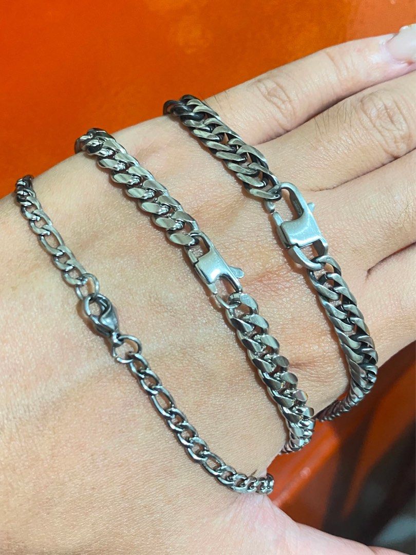 Silver Chain Bracelets - Figaro, Curb, and Cuban Link Styles (Category: Bracelets) located in Davao. Submitted by alessuh (Listing ID 1462697161, Image 2). Description: - Set of 3 silver-tone chain bracelets - Includes: 1 Figaro link, 1 Curb link, 1 Cuban link - All feature secure lobster clasp closures - Versatile: wear layered or individually - High-quality metal with a substantial feel.