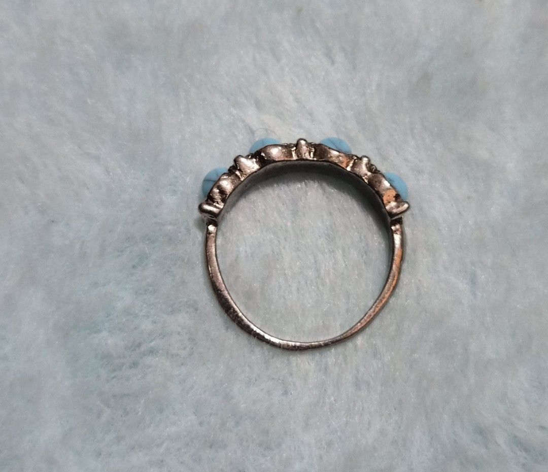 Silver Ring with Turquoise Stones Size 6/7 (Category: Rings) located in Mandaue City. Submitted by chuchi152615 (Listing ID 1462809184, Image 2). Description: - Classic silver band ring - Features five round, light blue turquoise stones - Band has decorative detailing - Timeless design, suitable for everyday wear or special occasions.