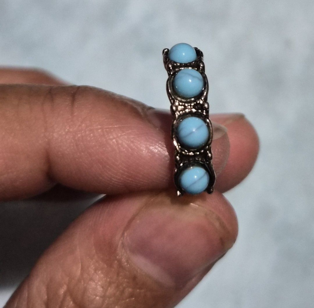 Silver Ring with Turquoise Stones Size 6/7 (Category: Rings) located in Mandaue City. Submitted by chuchi152615 (Listing ID 1462809184, Image 3). Description: - Classic silver band ring - Features five round, light blue turquoise stones - Band has decorative detailing - Timeless design, suitable for everyday wear or special occasions.