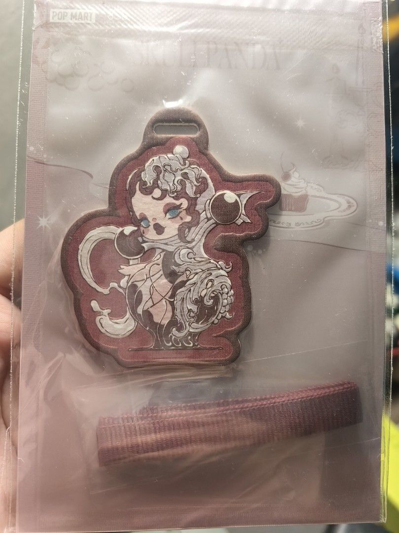 SKULLPANDA POPMART STRAP DESIGN KEYCHAIN SEALED (Category: Character Goods) located in San Fernando. Submitted by sseiyua (Listing ID 1462777546, Image 1). Description: came w my popmart order hehe mop: gcash mod: jnt have a good day!.