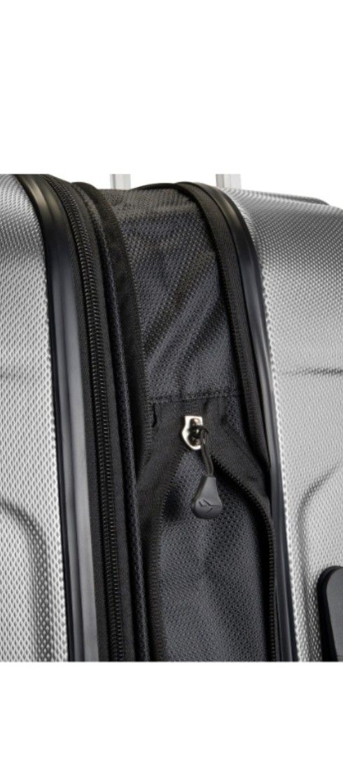 Skyway Luggage Co. Silver Hardshell Spinner Luggage (Category: Luggage) located in Manila. Submitted by purediamond888 (Listing ID 1462743811, Image 3). Description: - Brand: Skyway Luggage Co. - Color: Silver - Type: Hard Shell Luggage - Exterior: Textured finish -160 USD original price - Closure: Zipper - Wheels: Spinner wheels for easy maneuverability - Ideal for: Travel.
