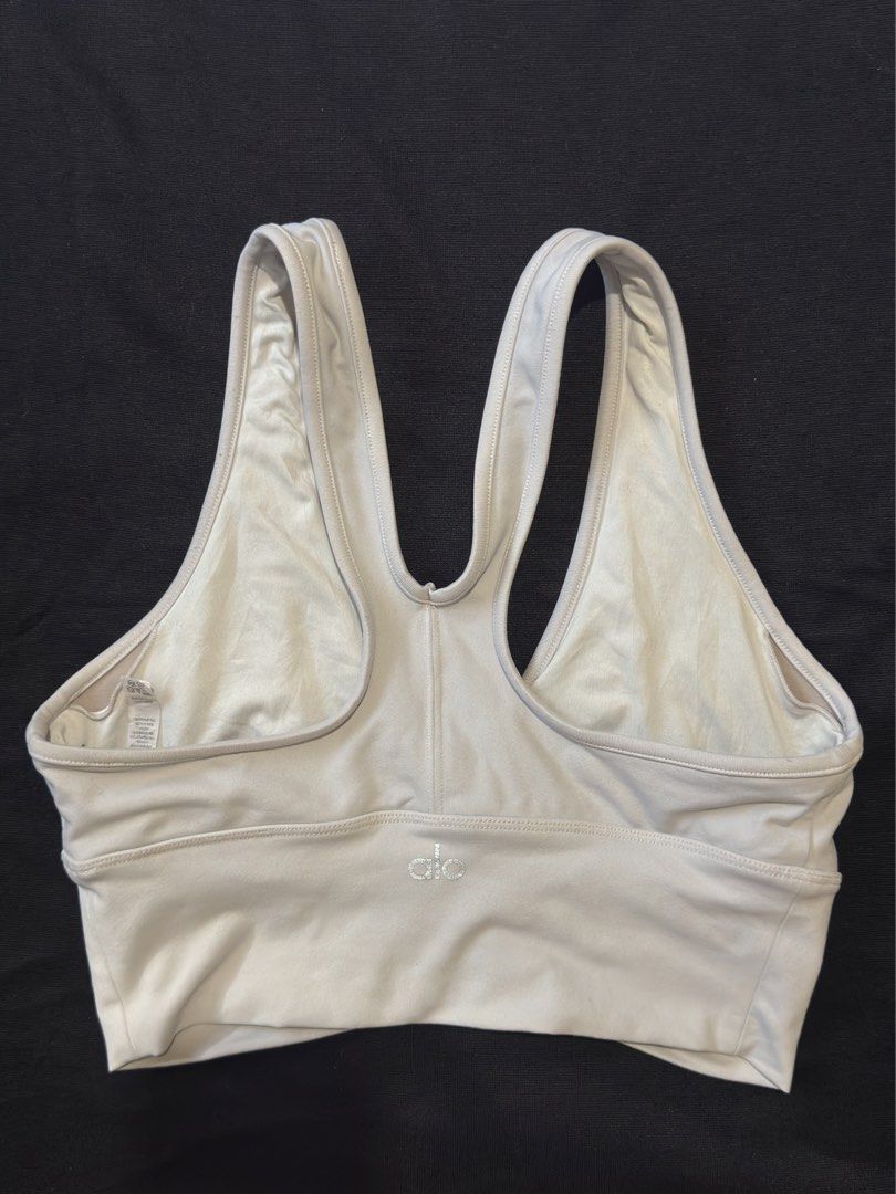 SMALL • alo wild thing bra (beige) (Category: Activewear) located in Angeles City. Submitted by secondset (Listing ID 1462704762, Image 3). Description: 📌Please read my bio before ordering 💰MOP: GCash only 🚚MOD: J&T only ❕Due to limited replies allowed on the app we will not reply to lowballers 🧘🏻‍♀️More items on @shopsecondset Width: 11” Length: 12.5” In very good used condition Has pad slots but no pads No flaws! Color irl is beige/light t